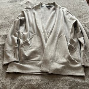 Perfect as a throw on any time of the year. Eddie Bauer two pocket cardigan.